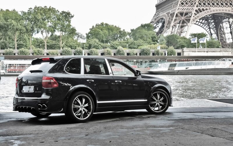 Black Porsche Cayenne by Eiffel Tower