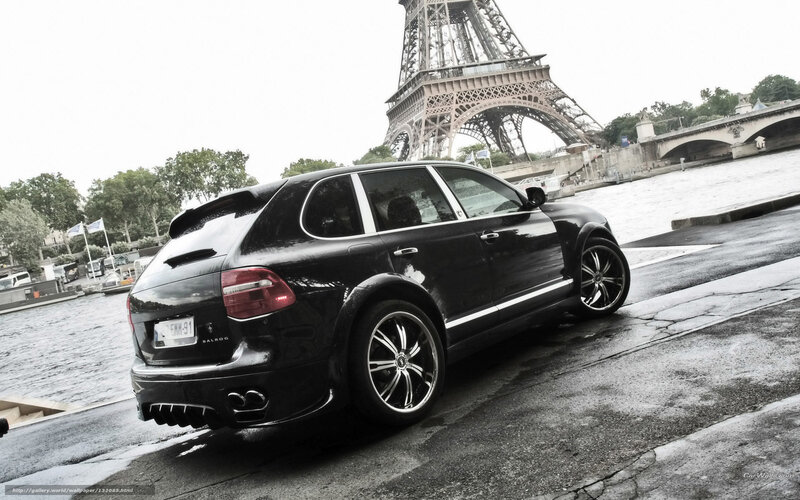 Black Porsche Cayenne by Eiffel Tower