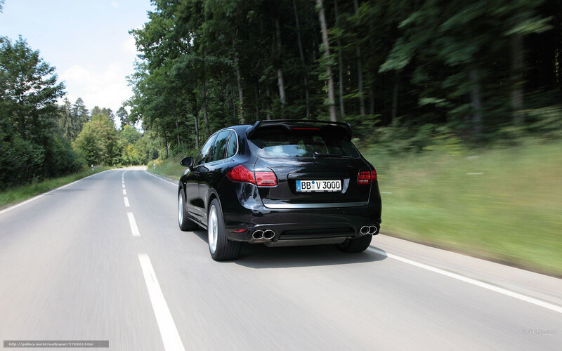Black Porsche Cayenne in motion