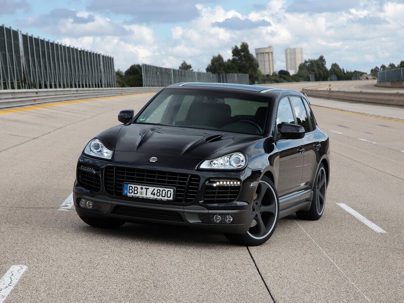 Black Porsche Cayenne on racetrack