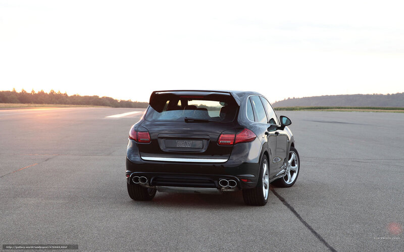 black porsche cayenne on tarmac