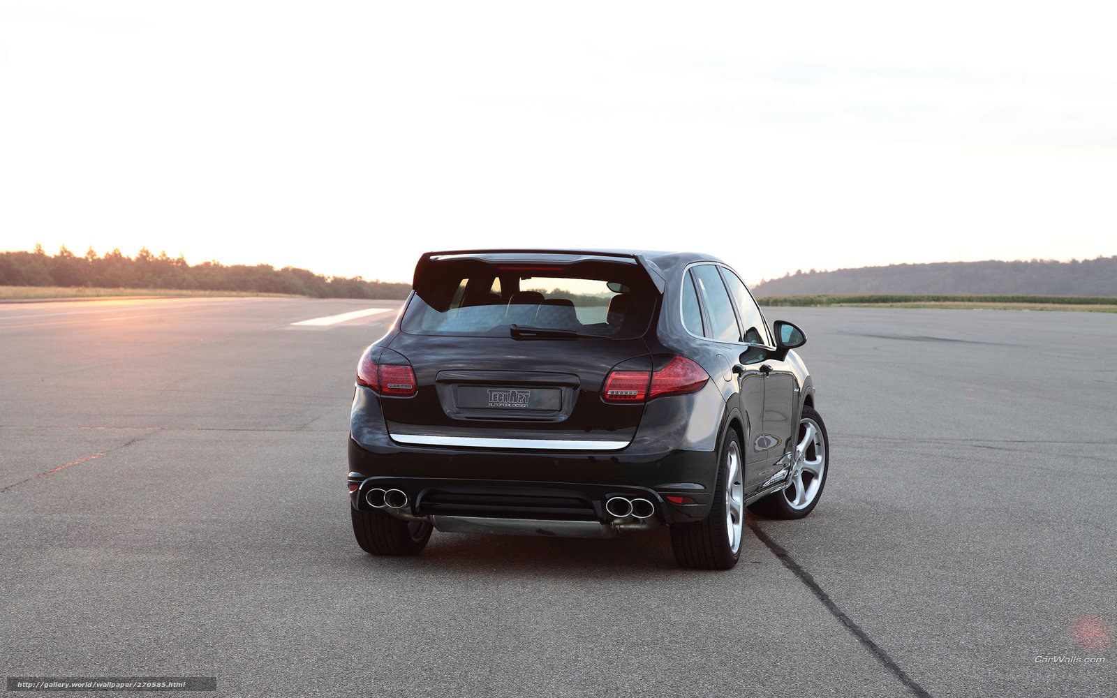 black porsche cayenne on tarmac