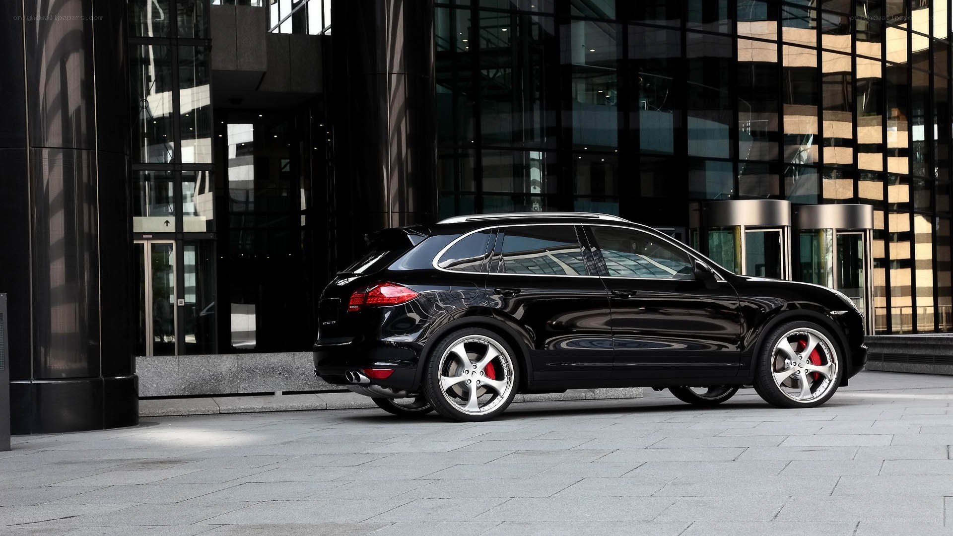 Black Porsche Cayenne parked outside