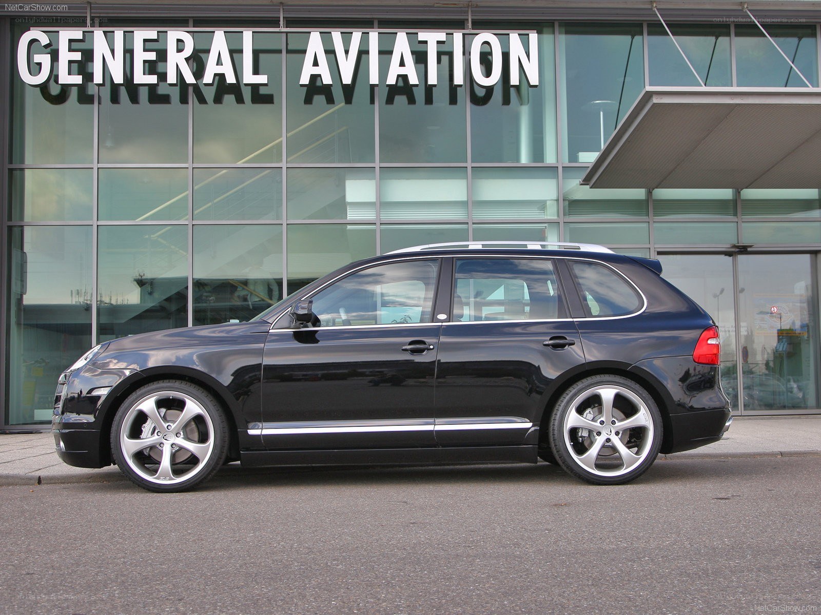 black porsche cayenne station wagon