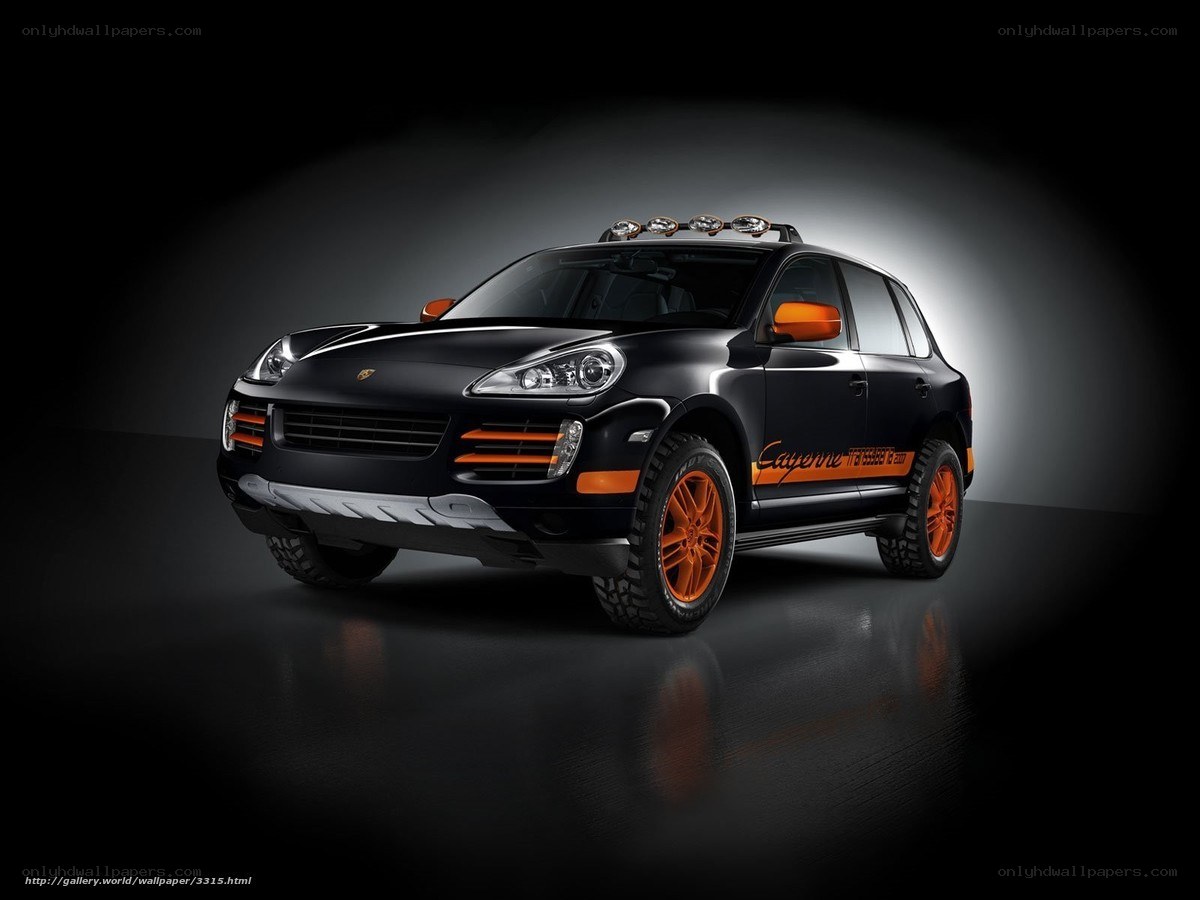 Black Porsche Cayenne with orange accents
