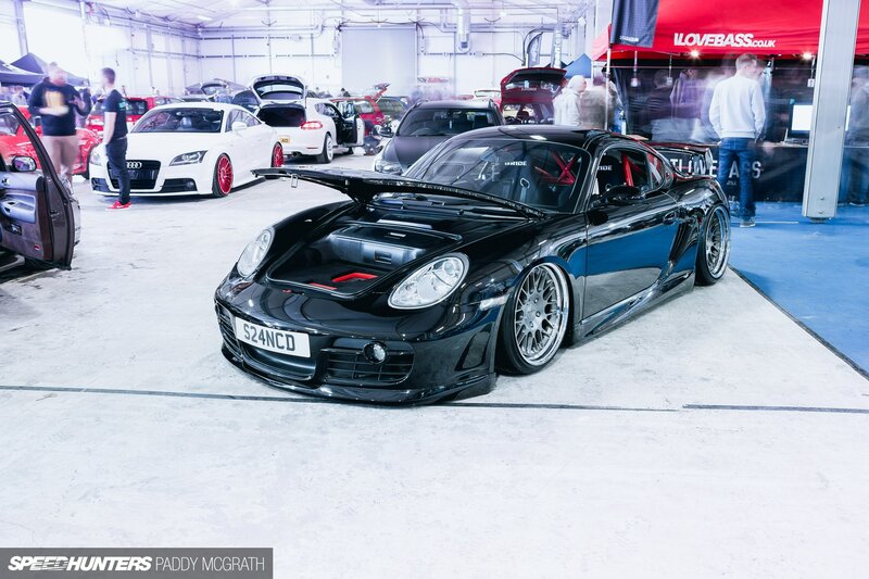 Black Porsche Cayman — Busy