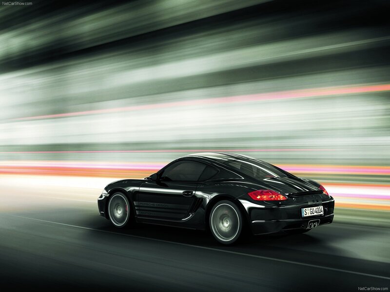 Black Porsche Cayman in motion