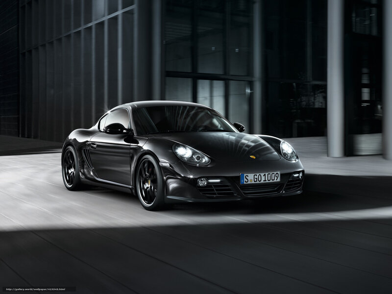 Black Porsche Cayman in urban setting