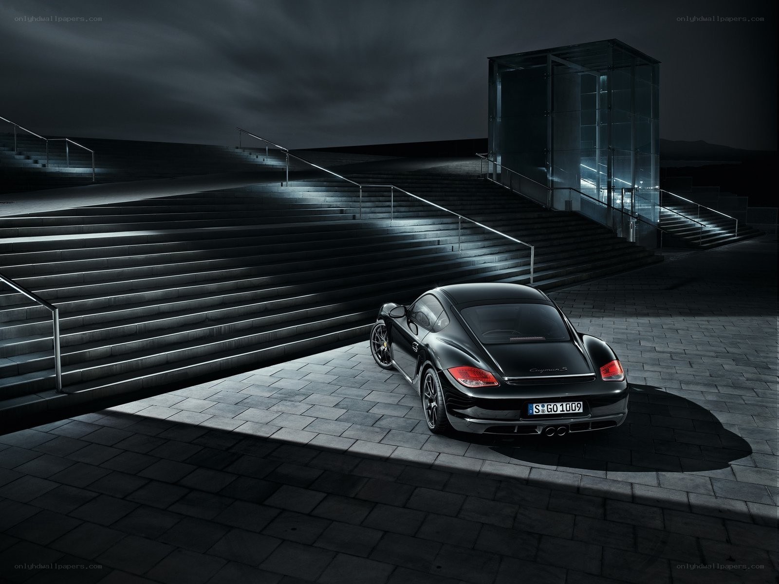 Black Porsche Cayman S at night