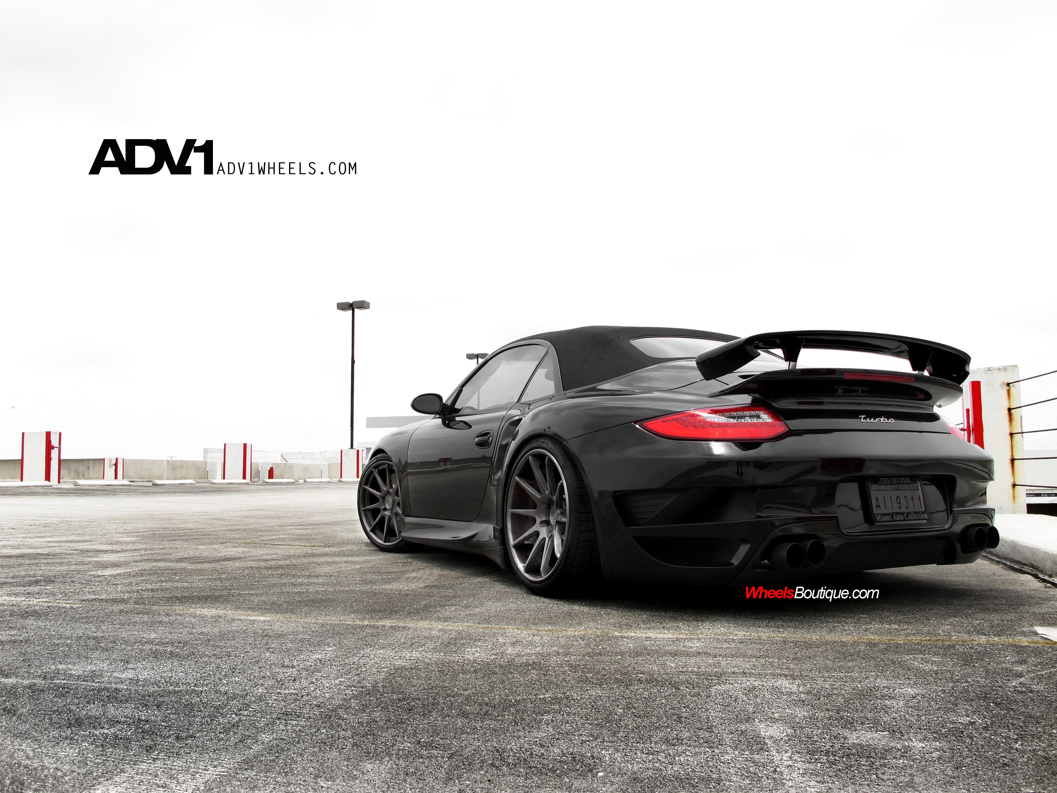 black porsche convertible