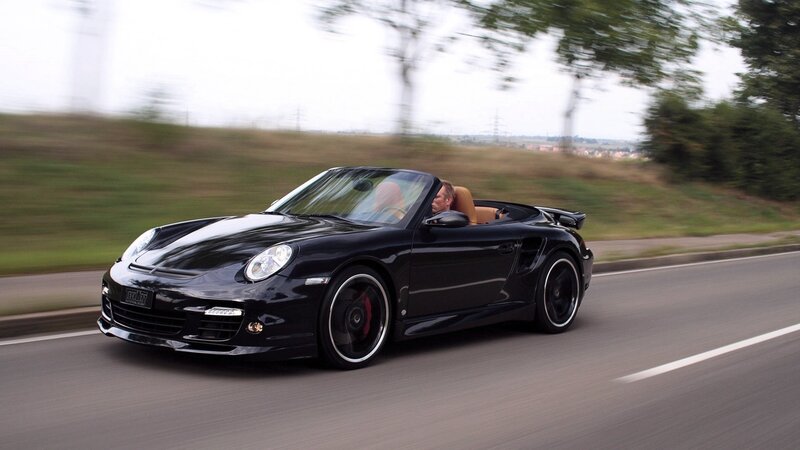 black porsche convertible on road