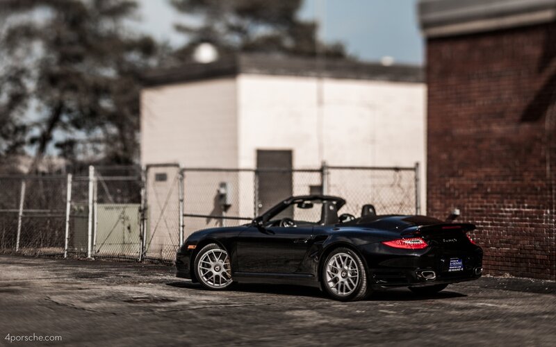Black Porsche convertible parked