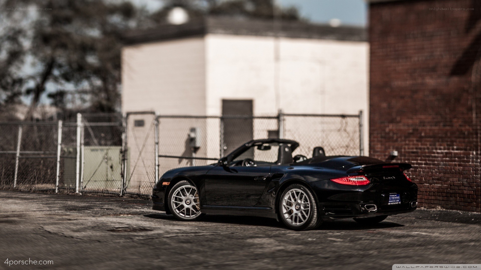 Black Porsche convertible parked