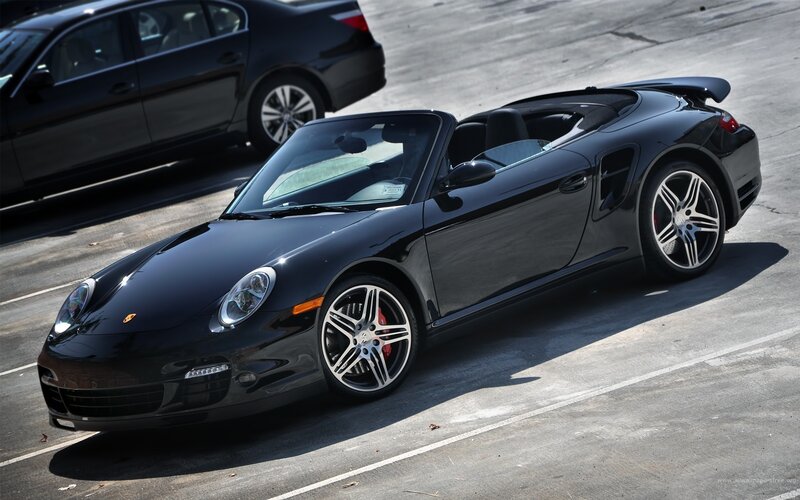 Black Porsche convertible parked