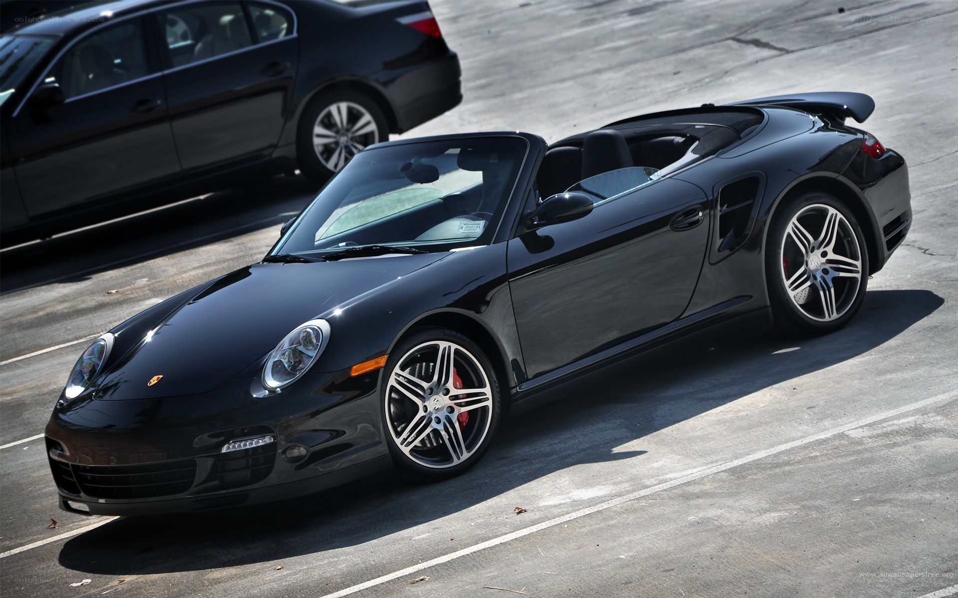 Black Porsche convertible parked