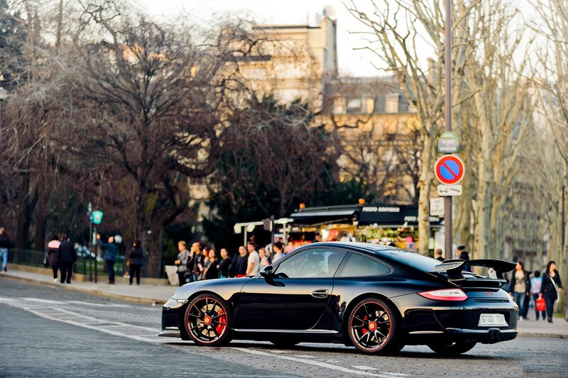 Black Porsche GT3 on city street