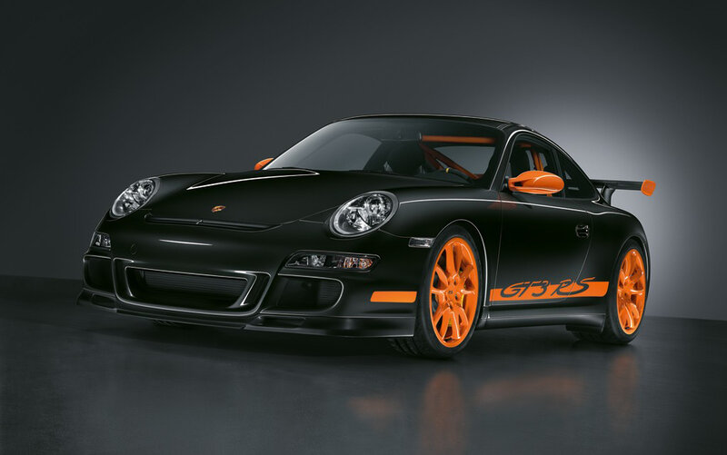 Black Porsche GT3 RS with orange accents