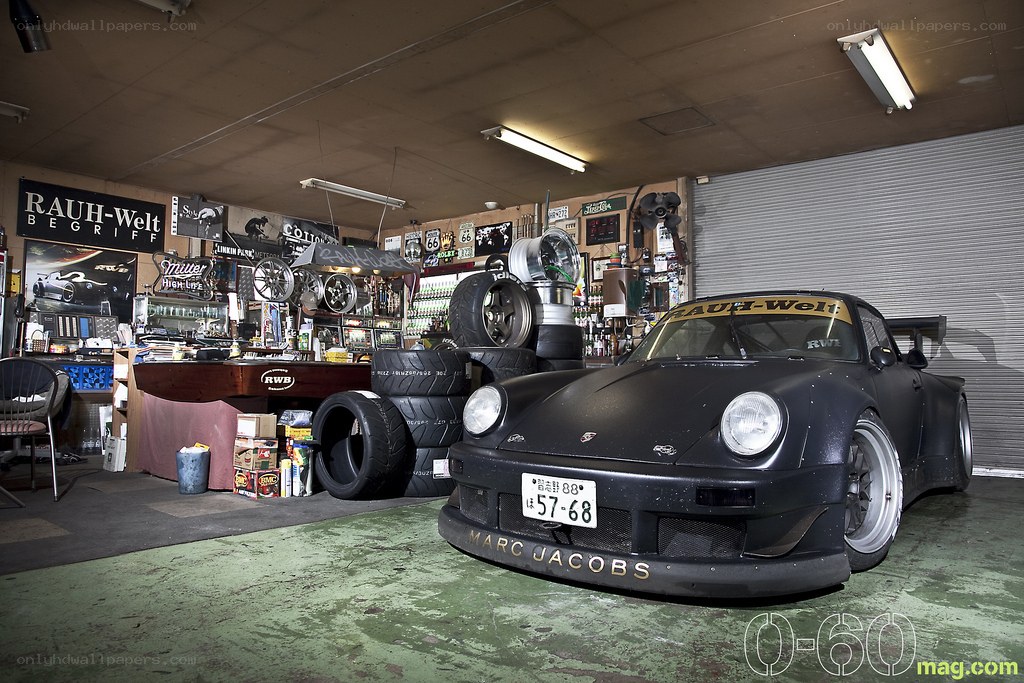 Black Porsche in a garage