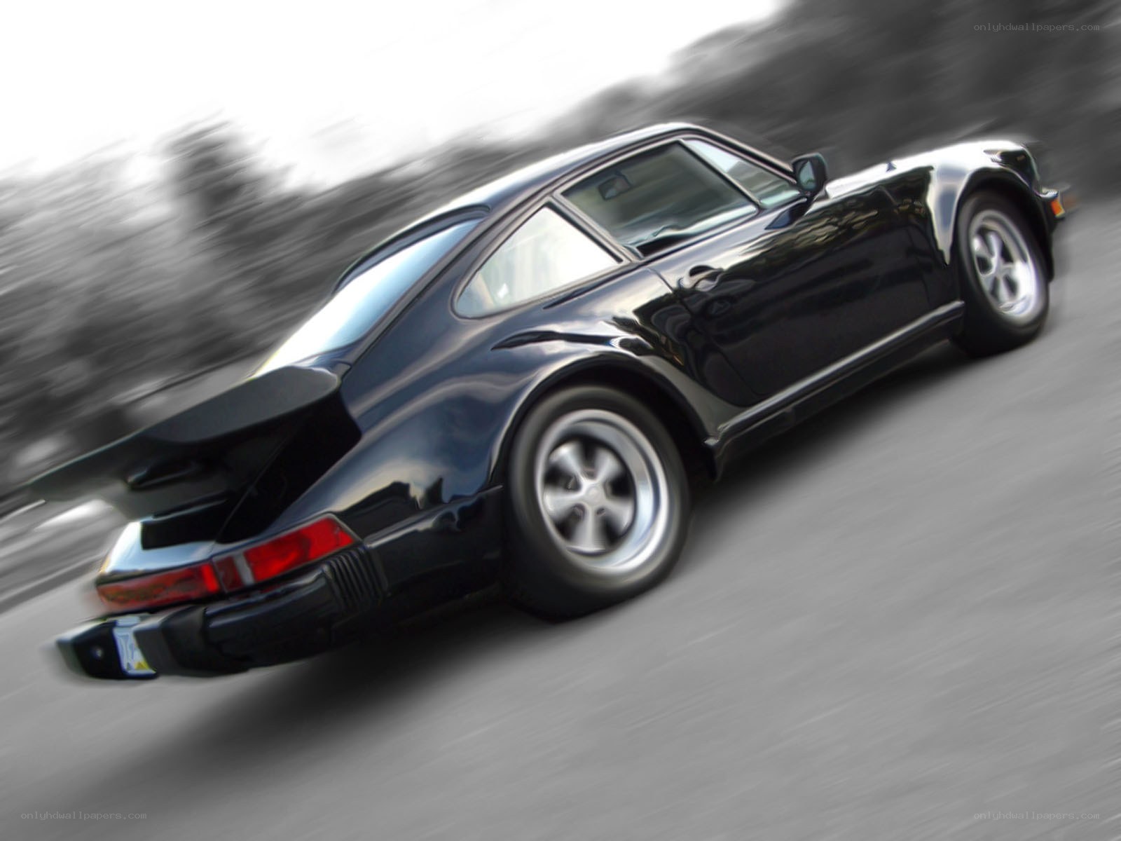 black porsche in motion