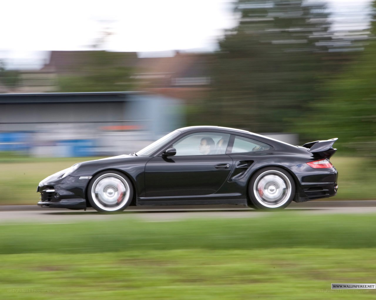 black porsche in motion