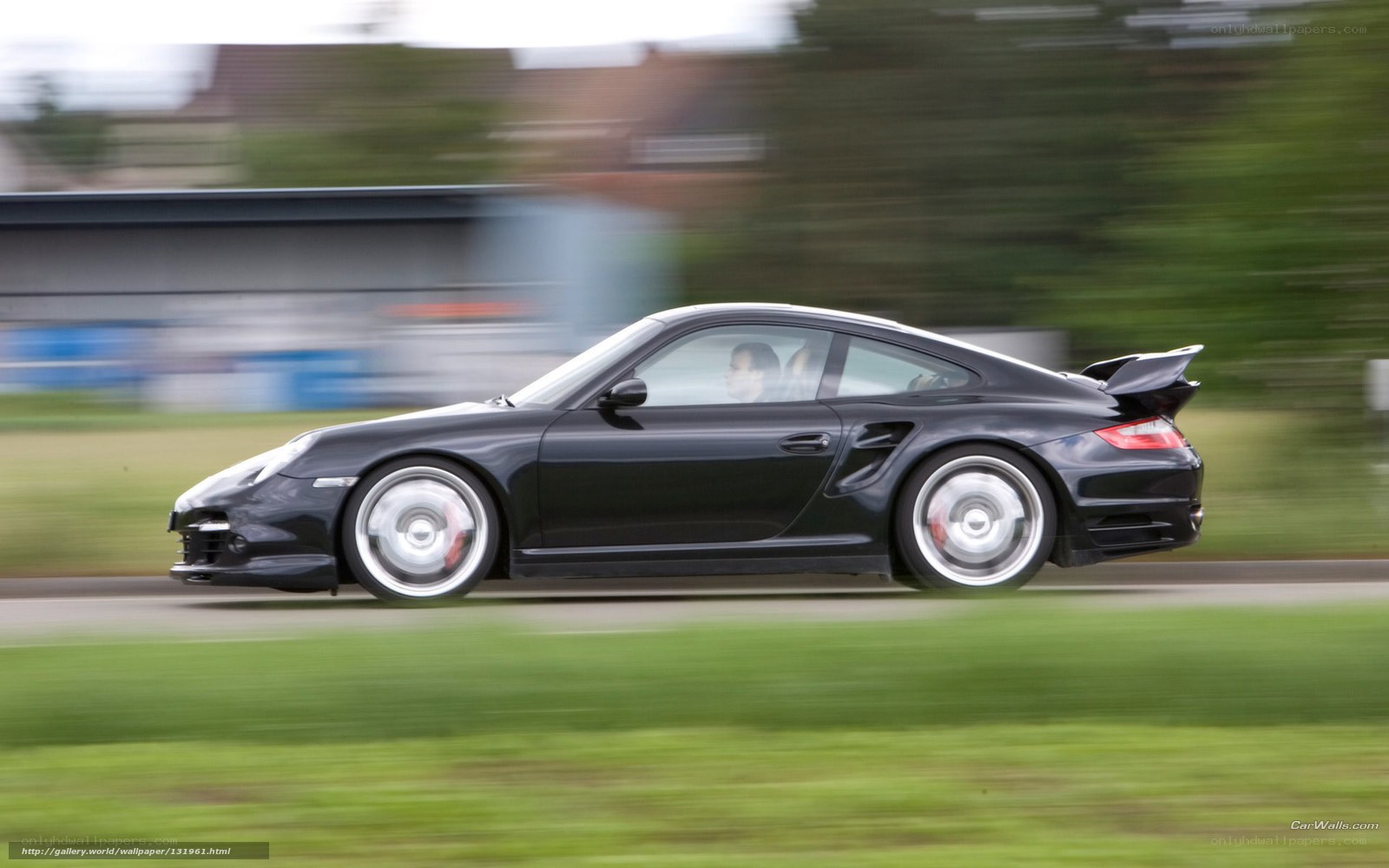 black porsche in motion