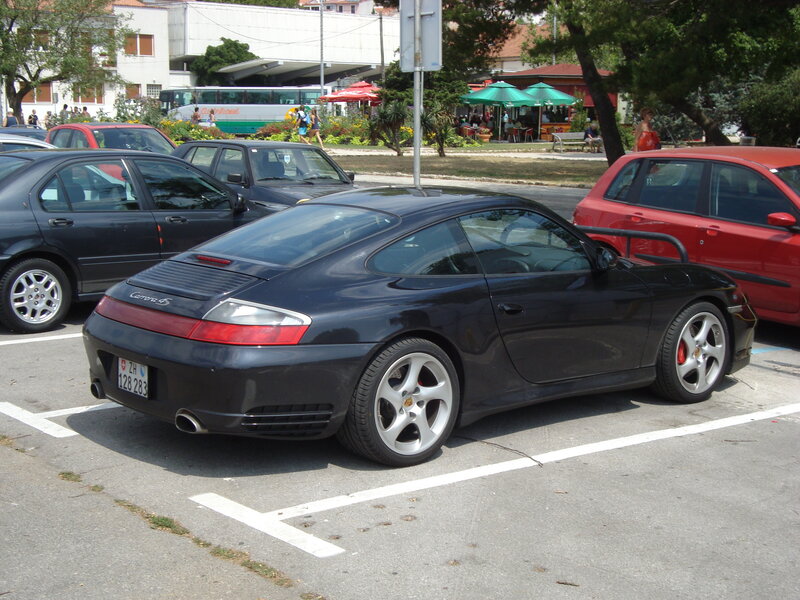 Black Porsche in parking lot
