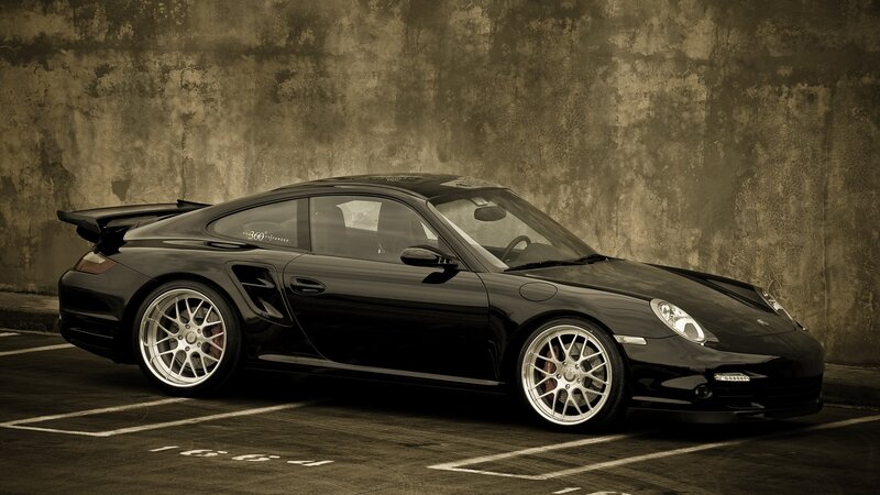 Black Porsche in parking lot