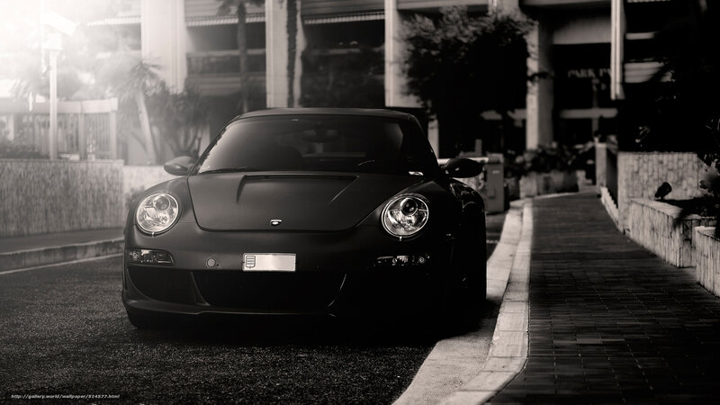 Black Porsche on a city street