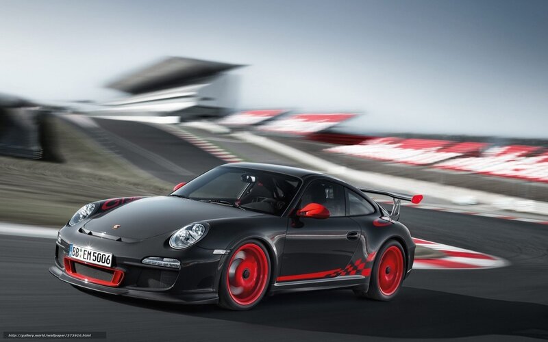 Black Porsche on a racetrack