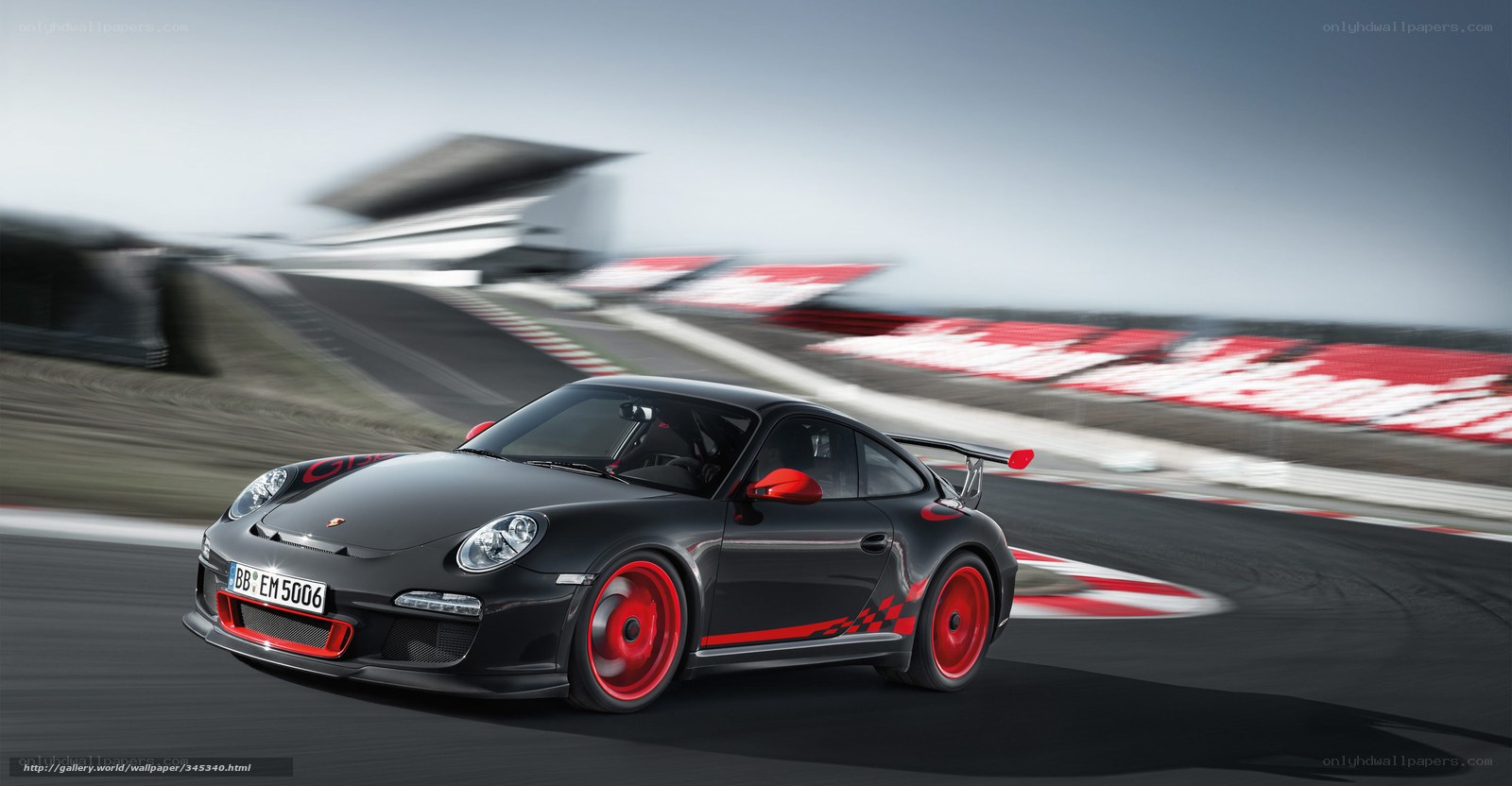 Black Porsche on a racetrack