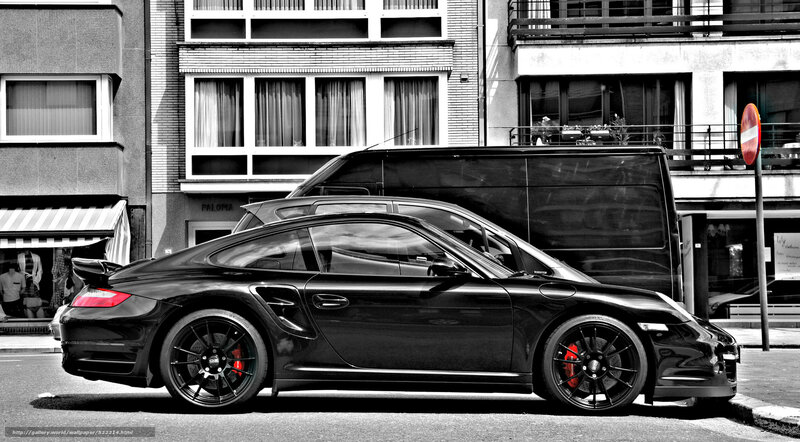 Black Porsche on city street