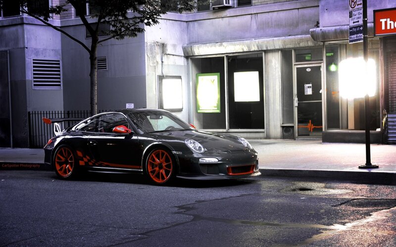 black porsche on city street