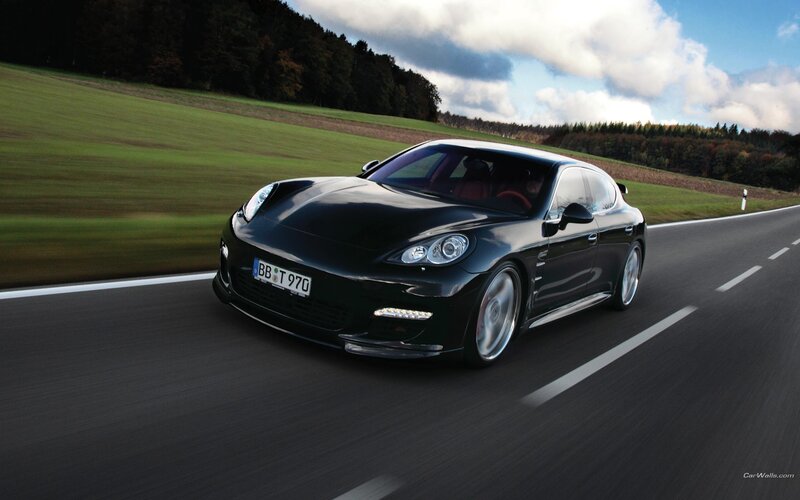black porsche on country road
