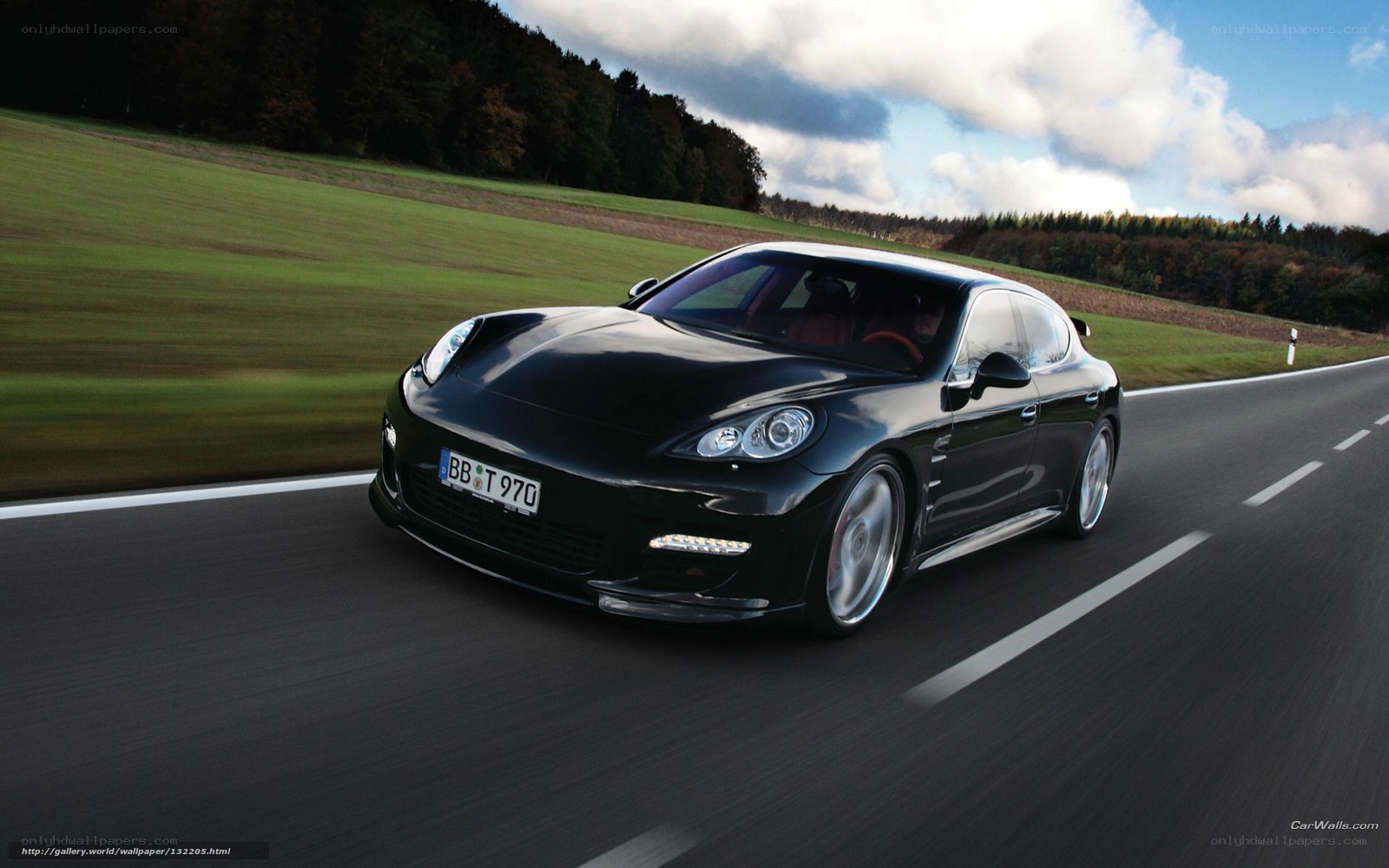 black porsche on country road