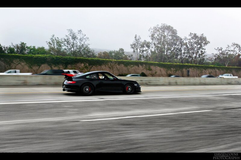 black porsche on highway