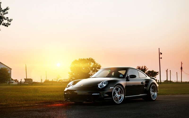 Black Porsche on Road — Dramatic, Sunset