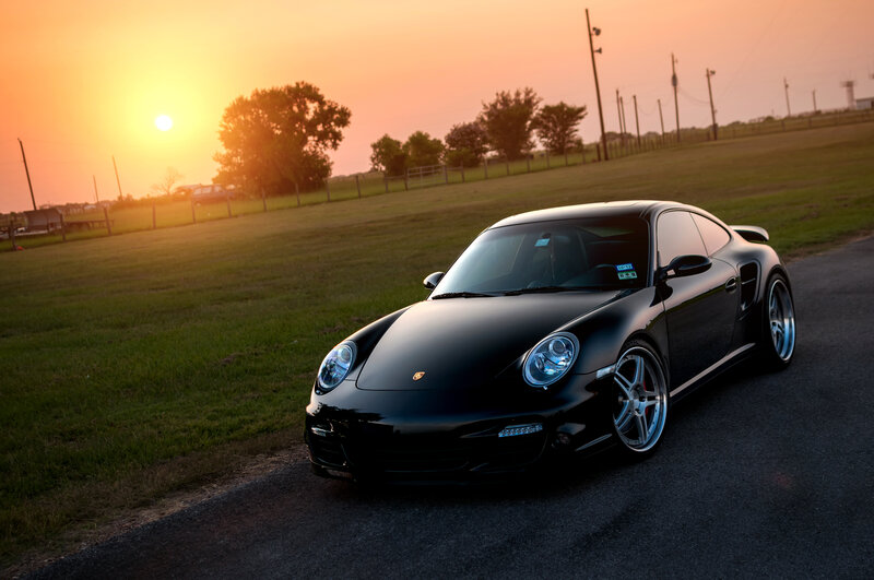 Black Porsche on Road — Serene