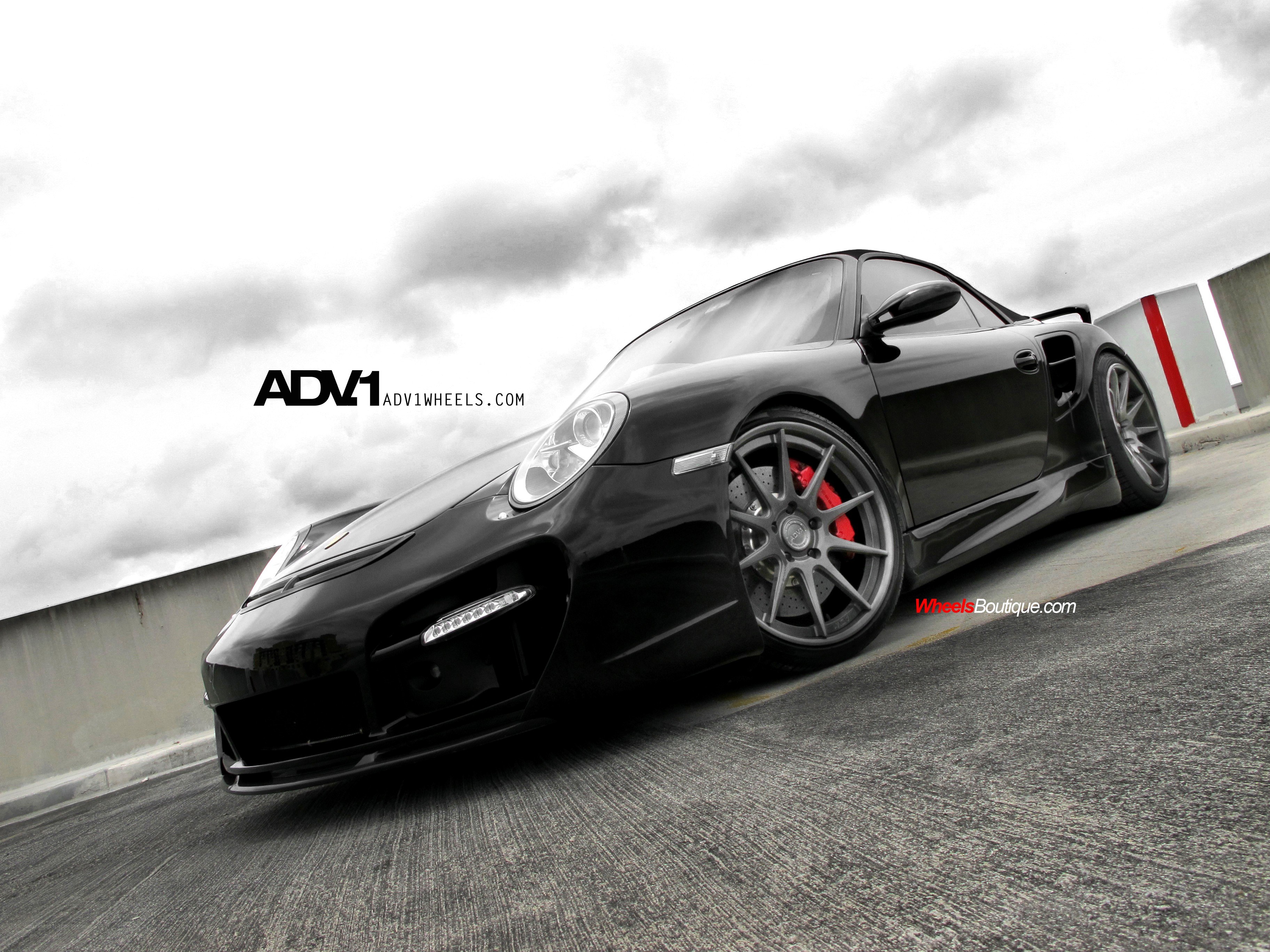 black porsche on track