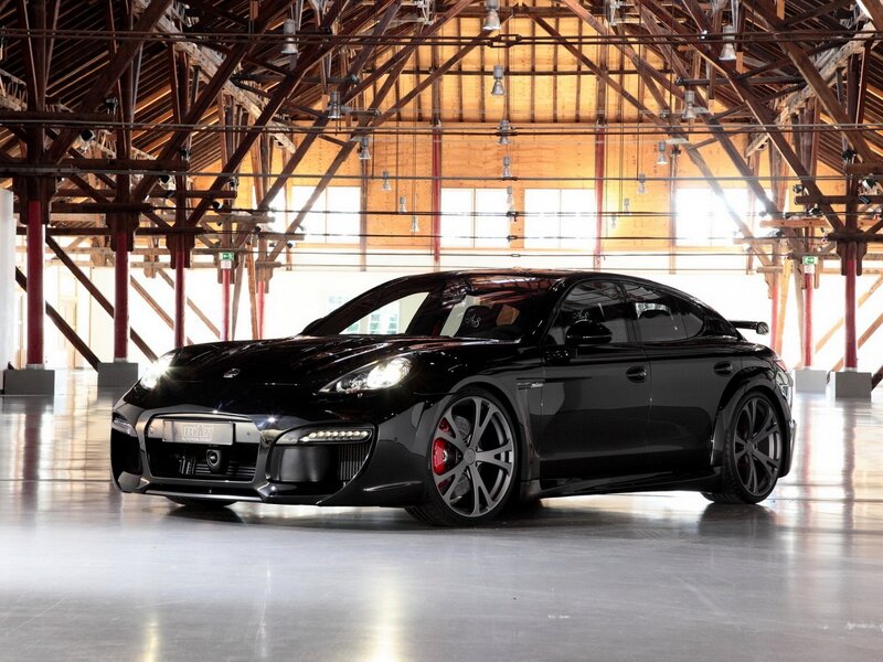 Black Porsche Panamera in a hangar