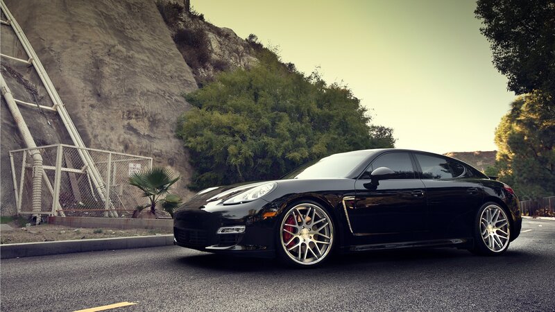 Black Porsche Panamera on a road