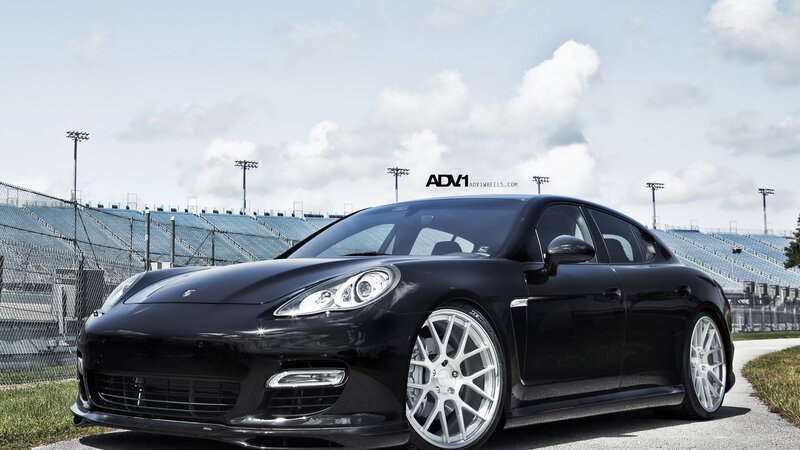 Black Porsche Panamera on racetrack