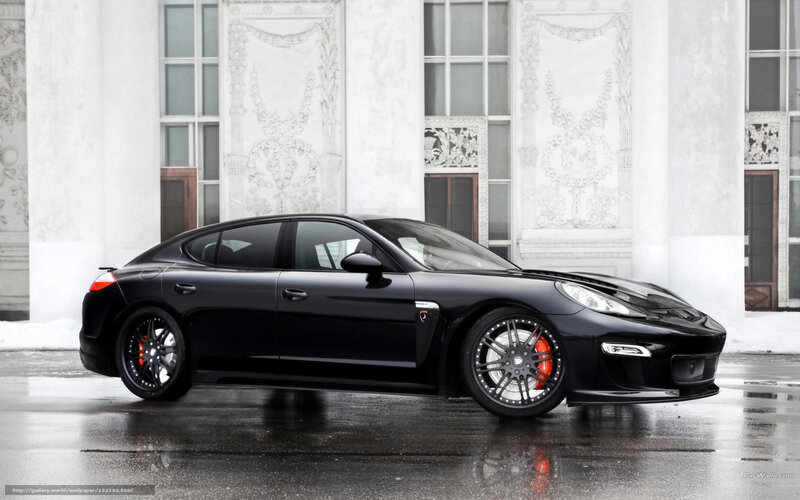 Black Porsche Panamera on wet street