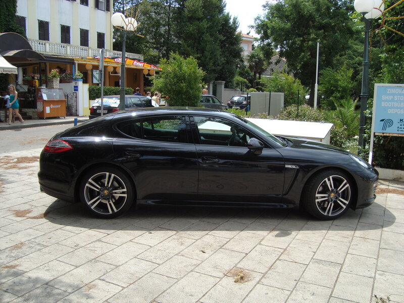 Black Porsche Panamera parked on pavement