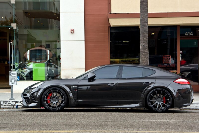 Black Porsche parked on street