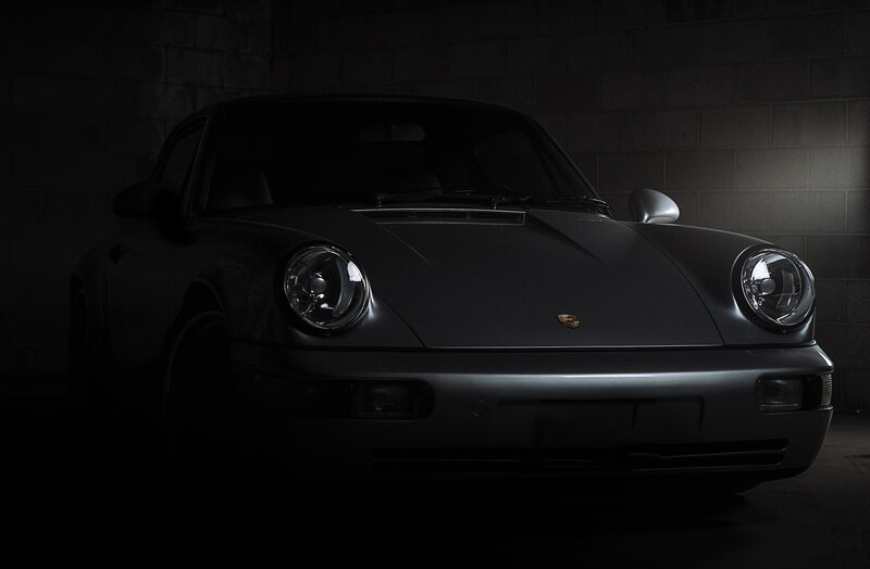 Black Porsche Sports Car — Dramatic, Night, Photograph, Headlights