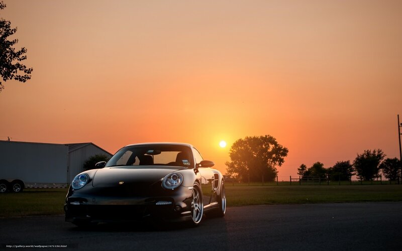 Black Porsche Sports Car — Orange