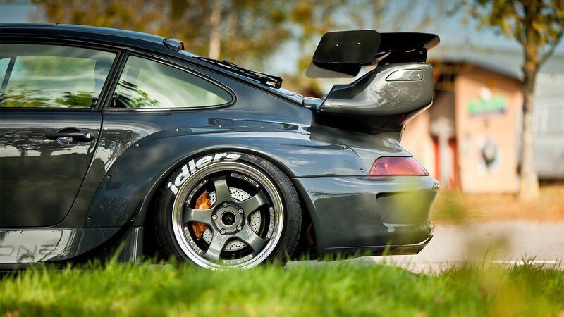 black porsche with large rear wing
