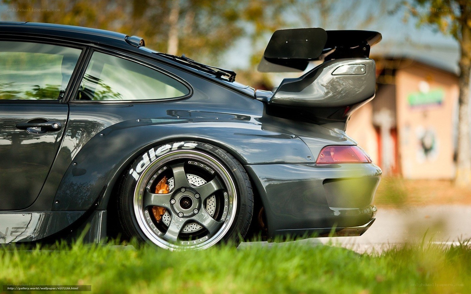 black porsche with large rear wing