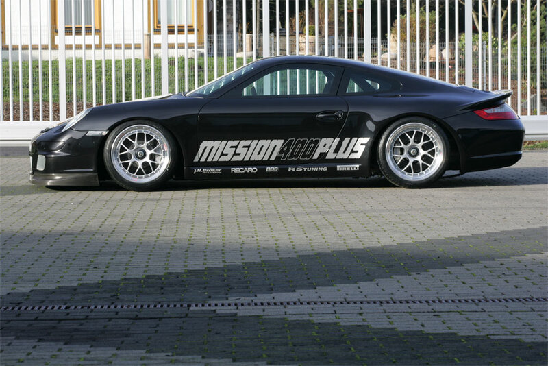 Black Porsche with Mission 400 Plus livery