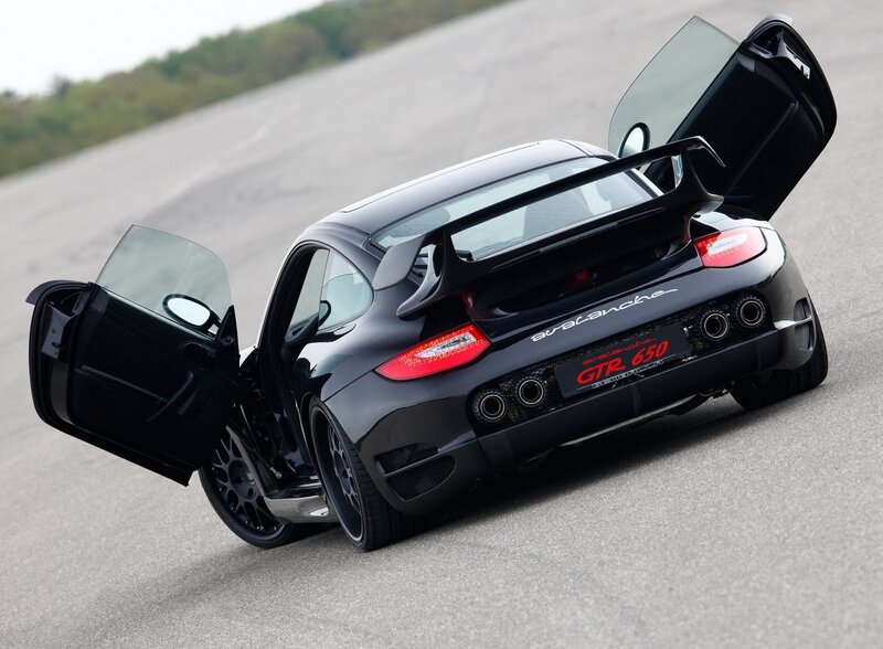 Black Porsche with open doors